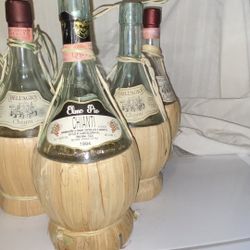 All SIX (6) Straw Wrapped Aged Empty Wine Bottles 
