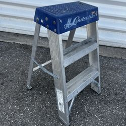 Louisville 2 ft. Aluminum Step Ladder with 300 lbs. Load Capacity Type IA Duty Rating. Retails $57.27