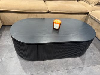 Moena Black 52" Fluted Oval Storage Oval Coffee Table