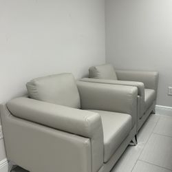 2 Oversized Leather Armchairs