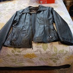 New leather coat from wilson size  medium for 40.00