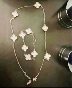 Clover, necklace, and bracelet