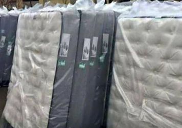 New Mattresses Still in Plastic Wrap