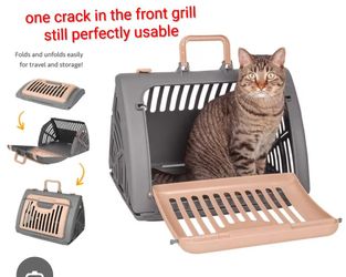 SportPet Designs Foldable Travel Cat Carrier in grey and https://offerup.com/redirect/?o=dGFuLkl0 features a collapsible design for storage, with hard