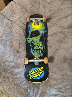Santa cruz skateboard complete with independent trucks and spitfire wheels