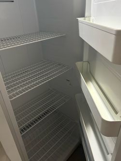 Full size fridge/freezer, like New