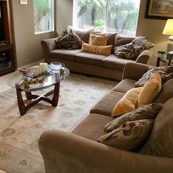 2 Living Room Sofas with 3 glass tables