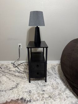 2 end tables, lamp included. Second end table still brand new in box. Everything for $150