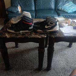 One Pair Of Nikes And Two Adidas