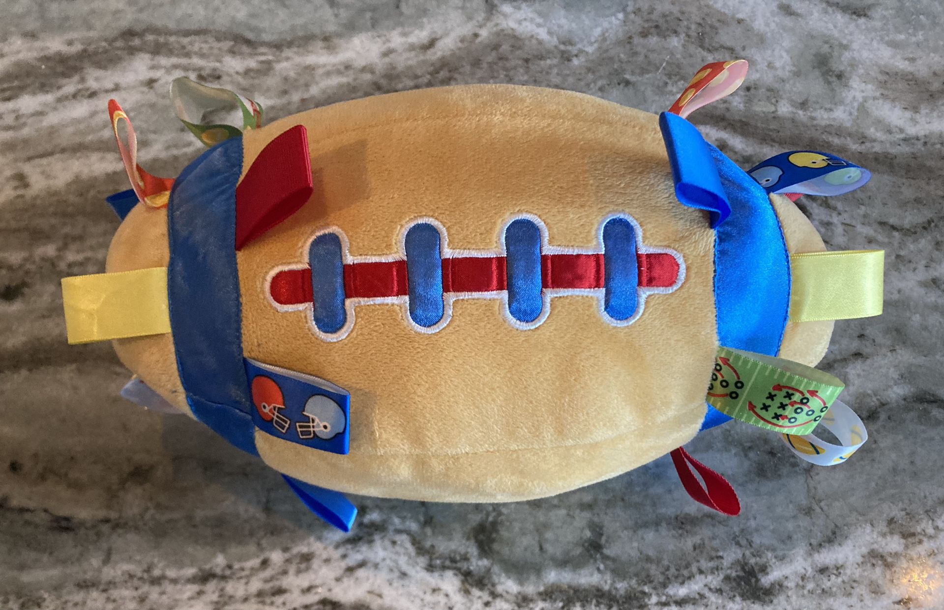 Taggies Retired Football Rattle Plush Toy
