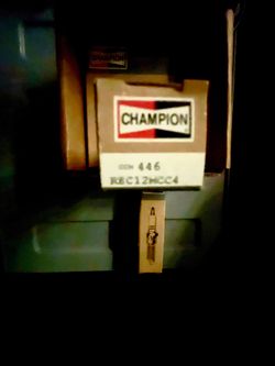(6) Brand new in box Champion Spark Plugs (part number REC12MCC4