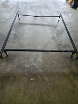 Full Size Box Spring and Metal Frame (missing one wheel) must haul away and take both  items