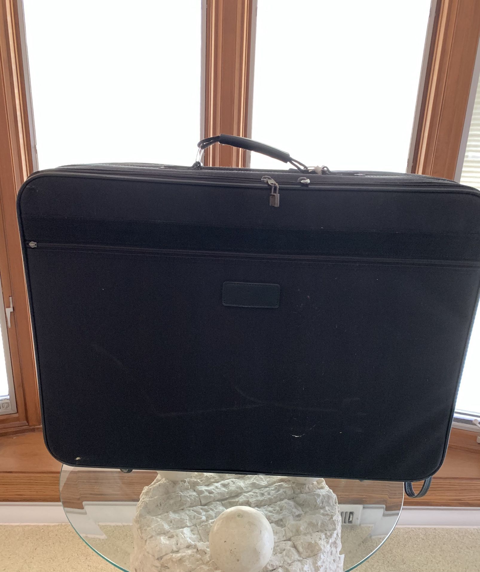 Suitcase Luggage 27”wide x 21”tall x 8”deep has pull strap 4 wheels VERY CLEAN