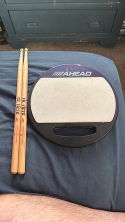 Drum sticks and drum pad
