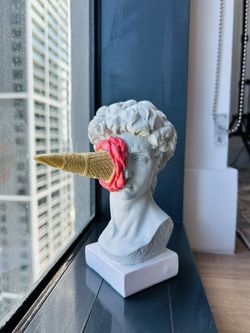 Sculpture Of David With Ice Cream On His Face