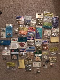 30 bags of beads and crafts supplies