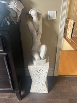 Two piece, plaster statue and pedestal
