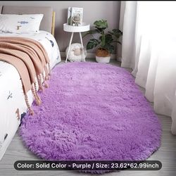 Brand new oval bedside rug very soft