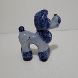 Decorative ceramic figurine of a dog painted in the Gzhel style 3.5" Tall 