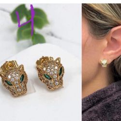 🐆 18K Gold-Plated Crystal Panther Stud EarringsChannel your inner strength and high-fashion elegance with these captivating Crystal Panther Head Stud