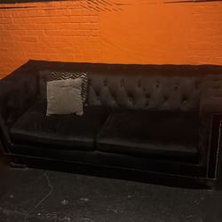 Black plush sofa