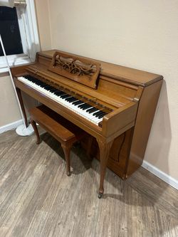 Wurlitzer Piano with Bench - delivery available