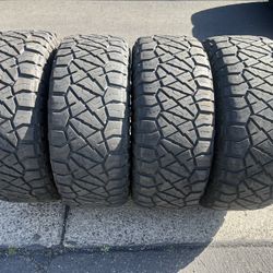 (4) 35x12.50R18 Nitto Ridge Grappler 