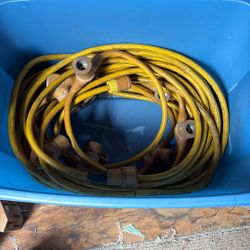 Hundred foot of 12 two wire with light sockets on it