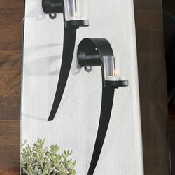 Metal wall candle holder