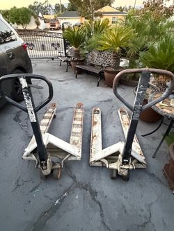 Crown Pallet Jack $75.each( will not go up and down )