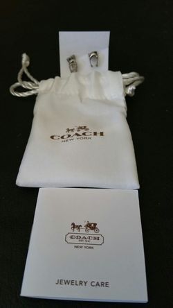 Coach logo earrings
