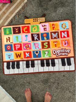 Singing and talking alphabet play mat