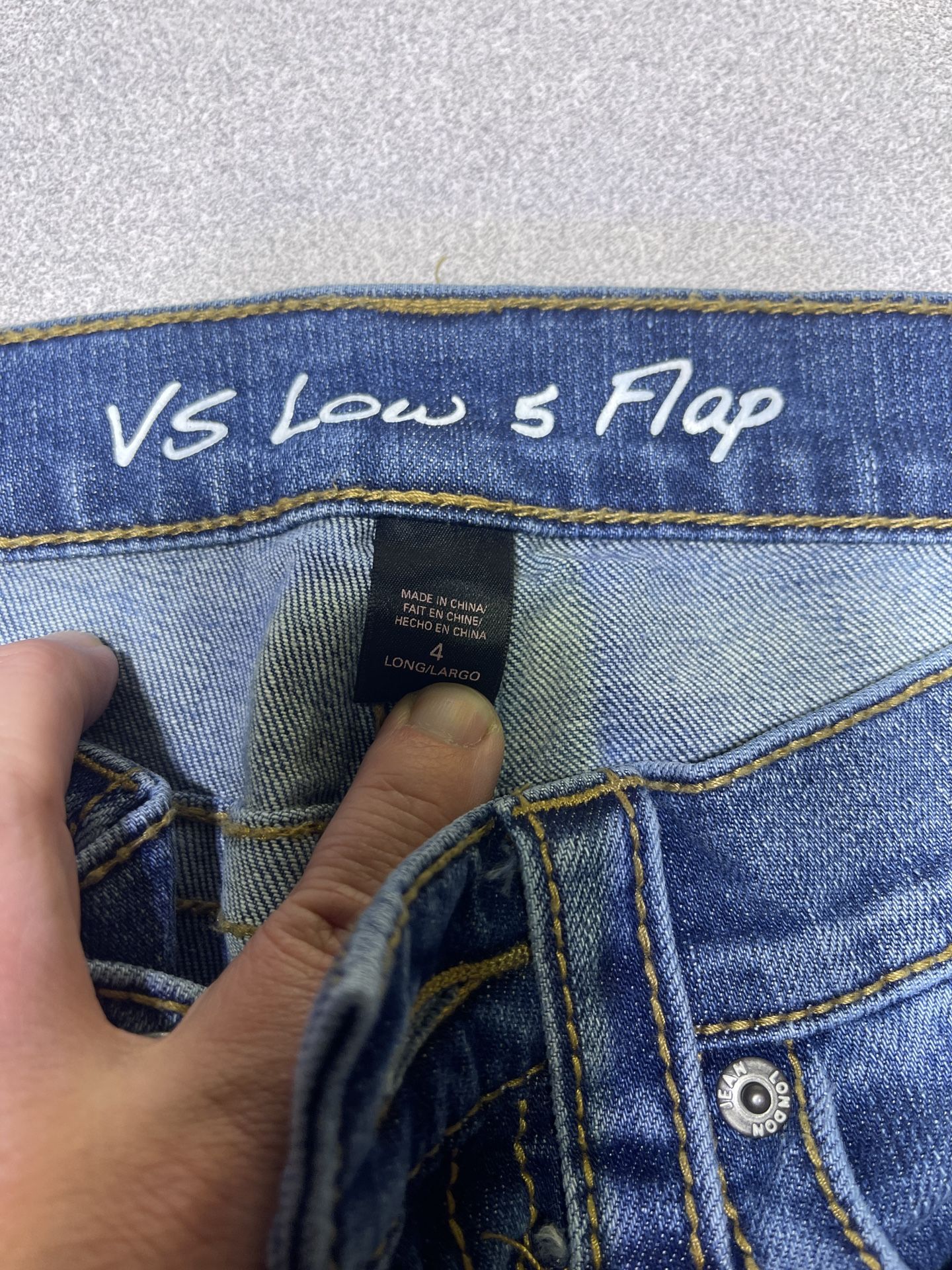 Victoria’s Secret VS low rise, 5 flap distressed London jeans