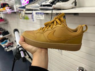 Brown Nike shoes