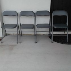 4 Gray Folding Chairs 