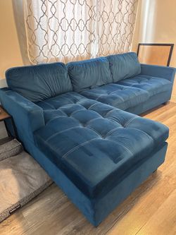 Blue suede sofa