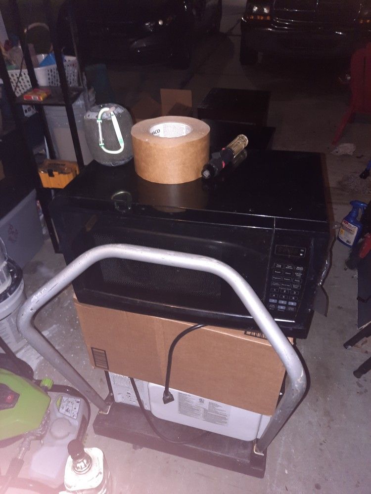 Small Black Working Microwave 