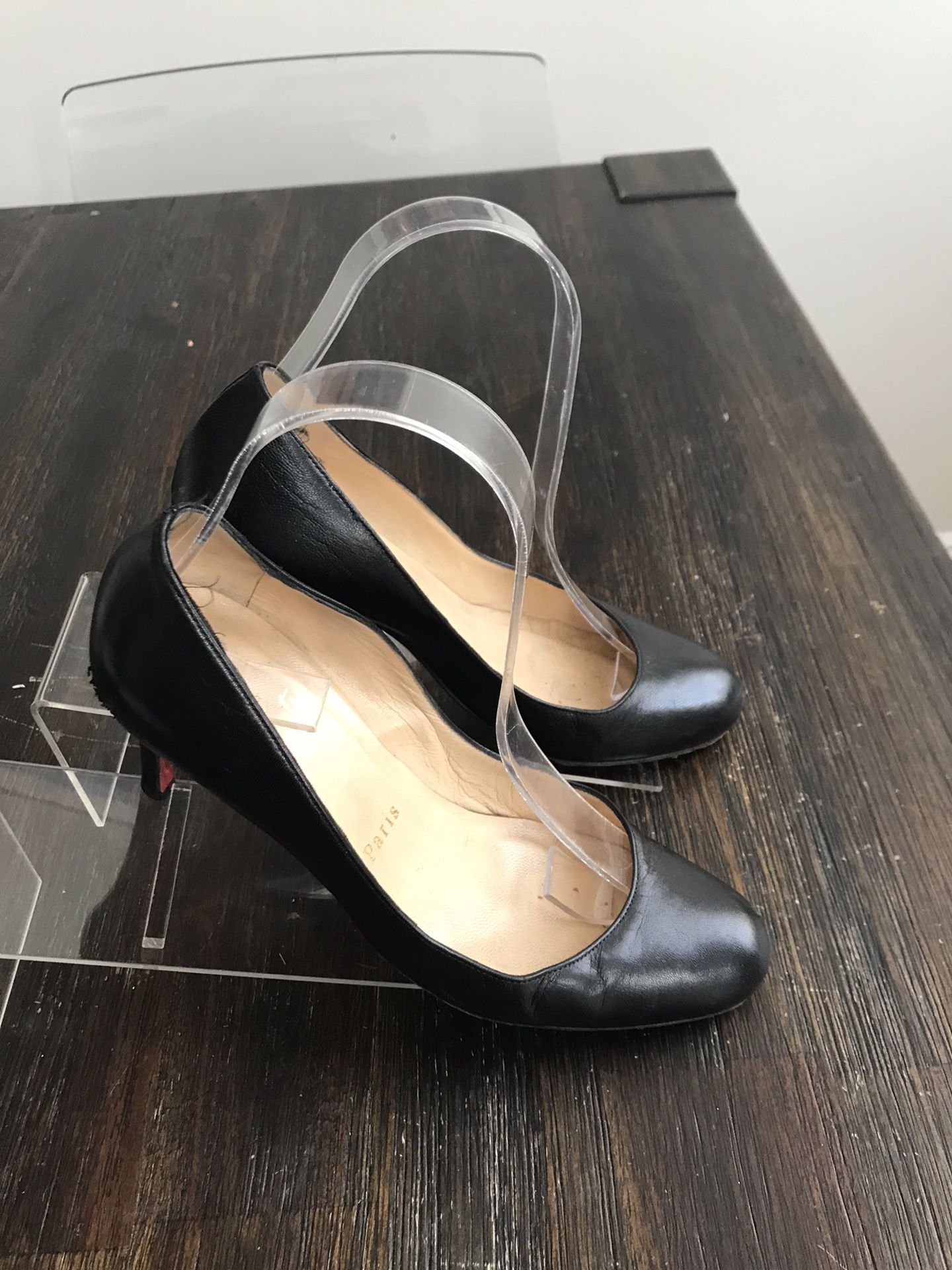 Christian Louboutin Black Heels Red Bottoms Size 37. Condition is Pre-owned. See pictures ask questions and make an offer!