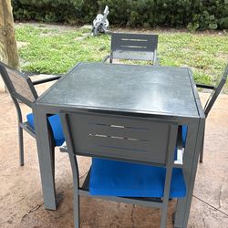 Patio furniture table and chairs