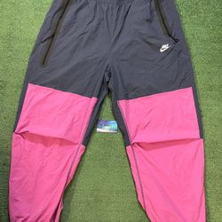 Nike tech woven pants blue and pink pants