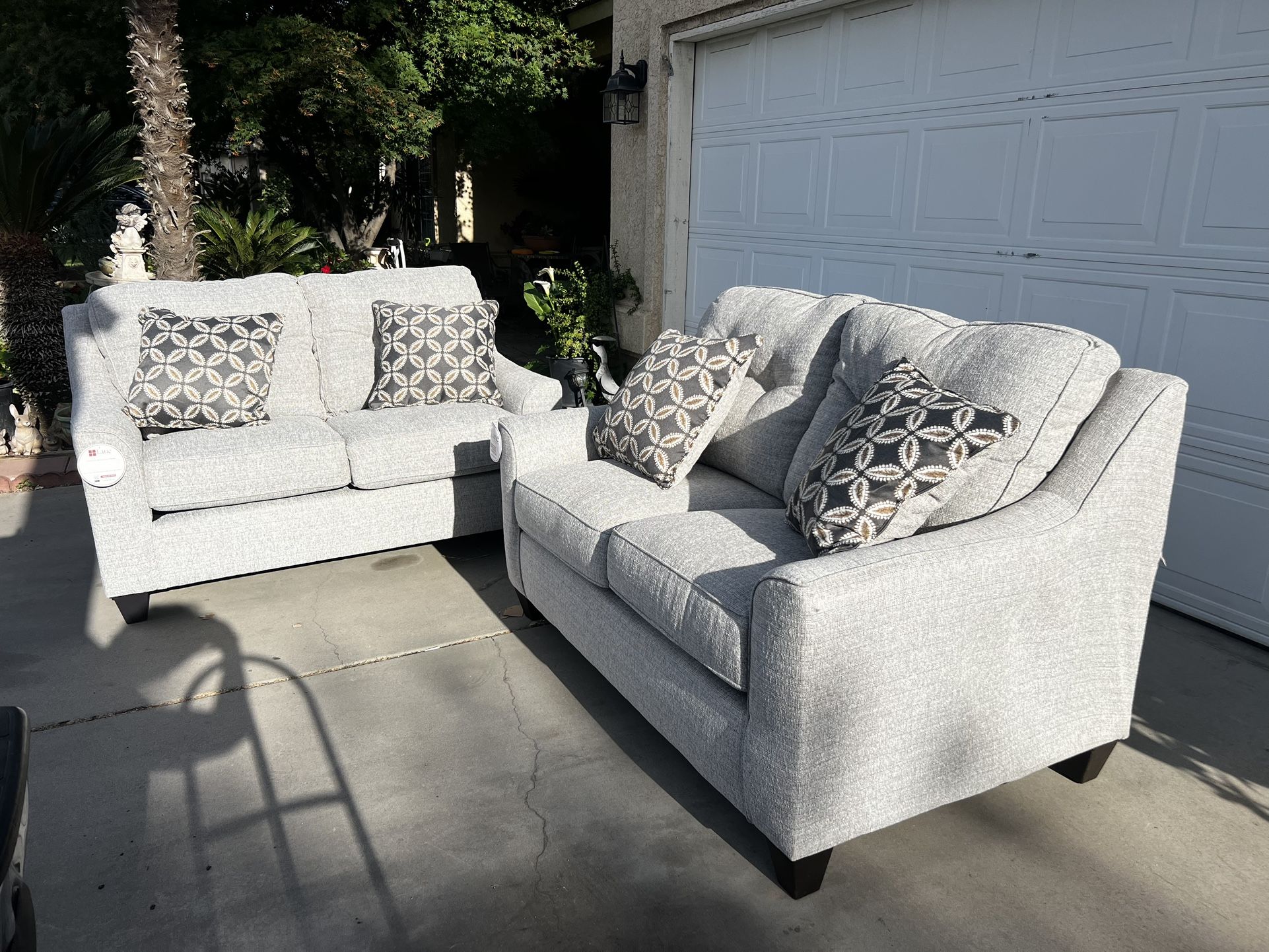 Brand New. (Set of 2) Lane Love Seat Sofa’s. Tweed color with accent pillows.  $549