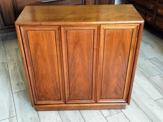 Mid Century Drexel Declaration Walnut Petite Cabinet Designed by Kipp Stewart.