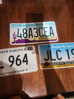 (3) NORTH DAKOTA AND ARIZONA LICENSE PLATES