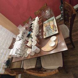 Dining table with 6 chairs, drawers and pop up center leaf 
