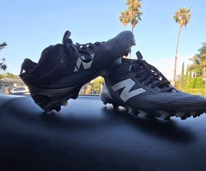 New Balance FreezeLX V5 lacrosse cleats in black.