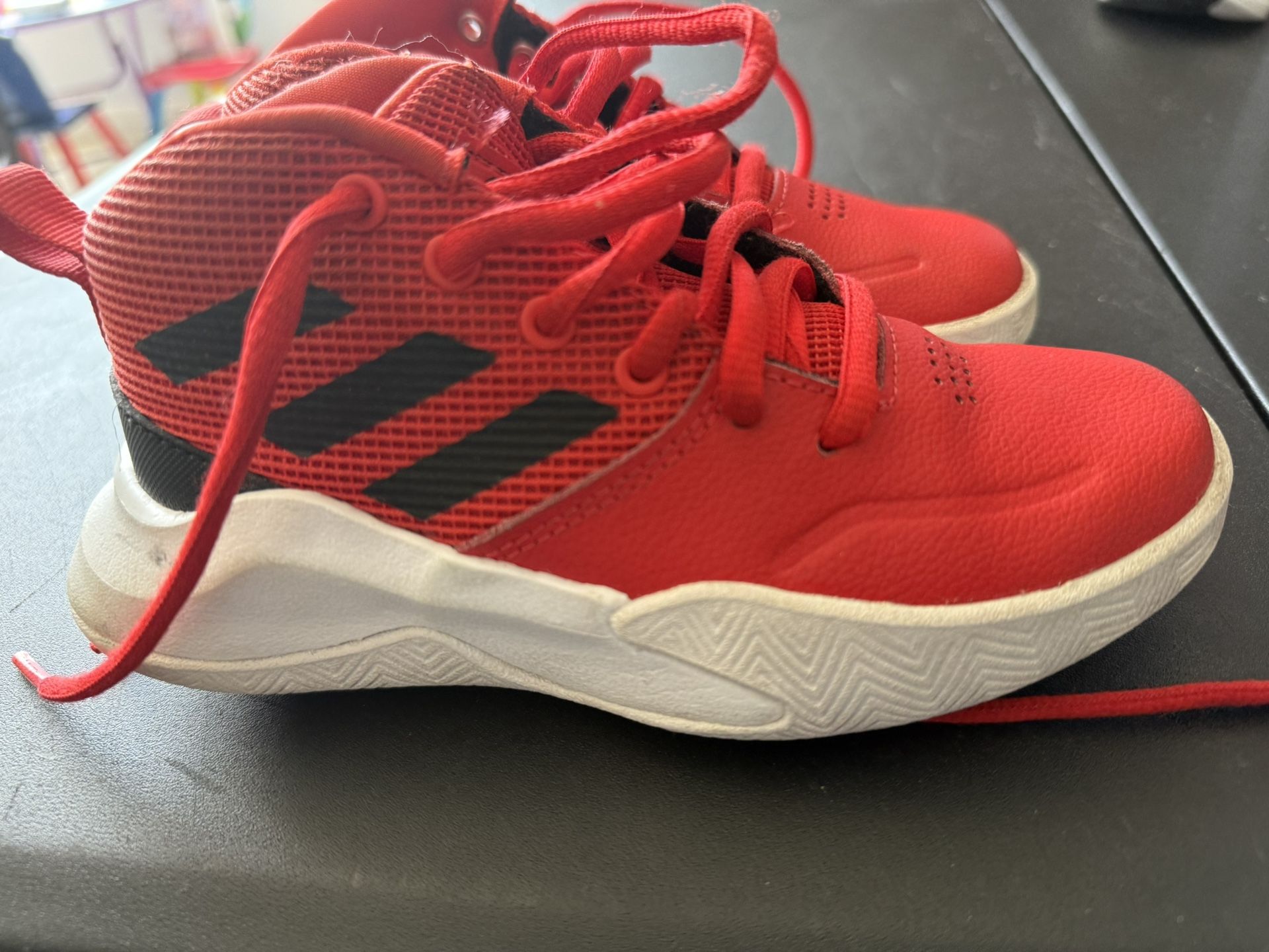 Adidas Red and Black Sneakers with Modern Silhouette