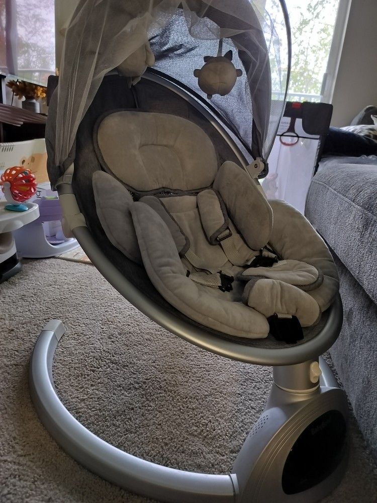 Baby swing, barely used.