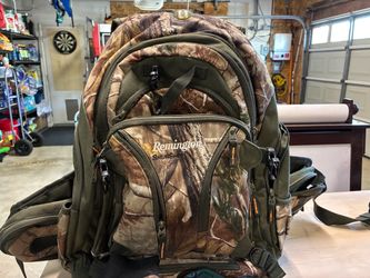 Hunter’s hydration backpack with gloves and headlamp