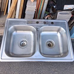Pro Flo Stainless Steel Sink. 33" x 22". 6" depth. $20.00