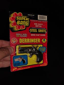 Toy cap gun diecast Derringer